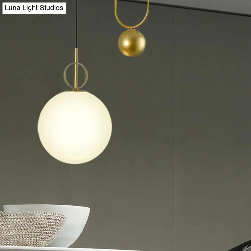 Modern White Glass Sphere Pendant Light with Golden Hanging Fixture for Bedrooms