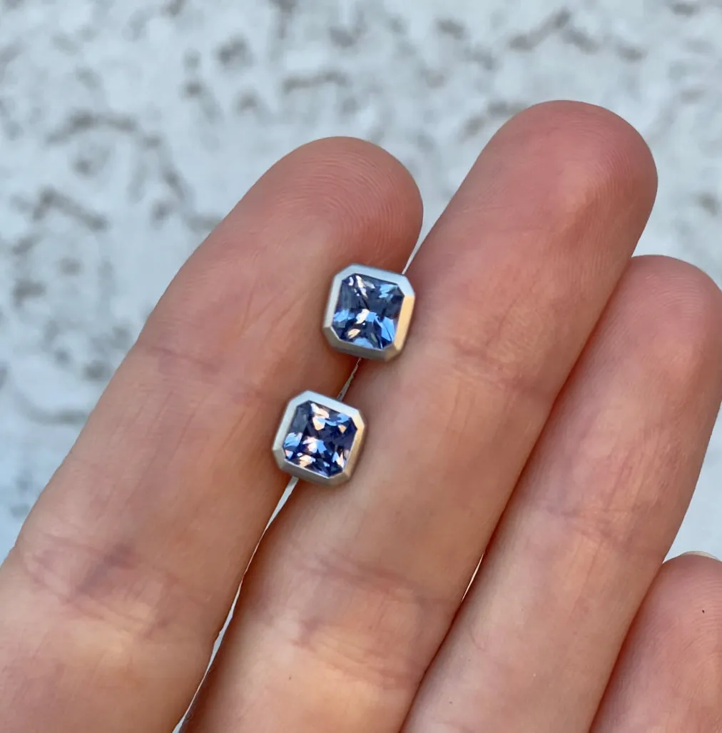 Radiant Cut Sapphire and 18k white gold bezel set earrings